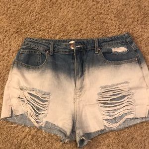 Fading denim shorts mid-rise destressed
